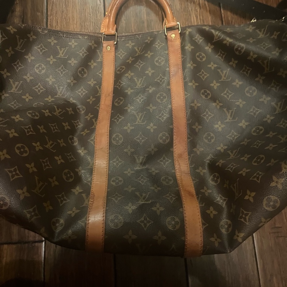 Authentic Louis Vuitton 55 keep all. Good condition.